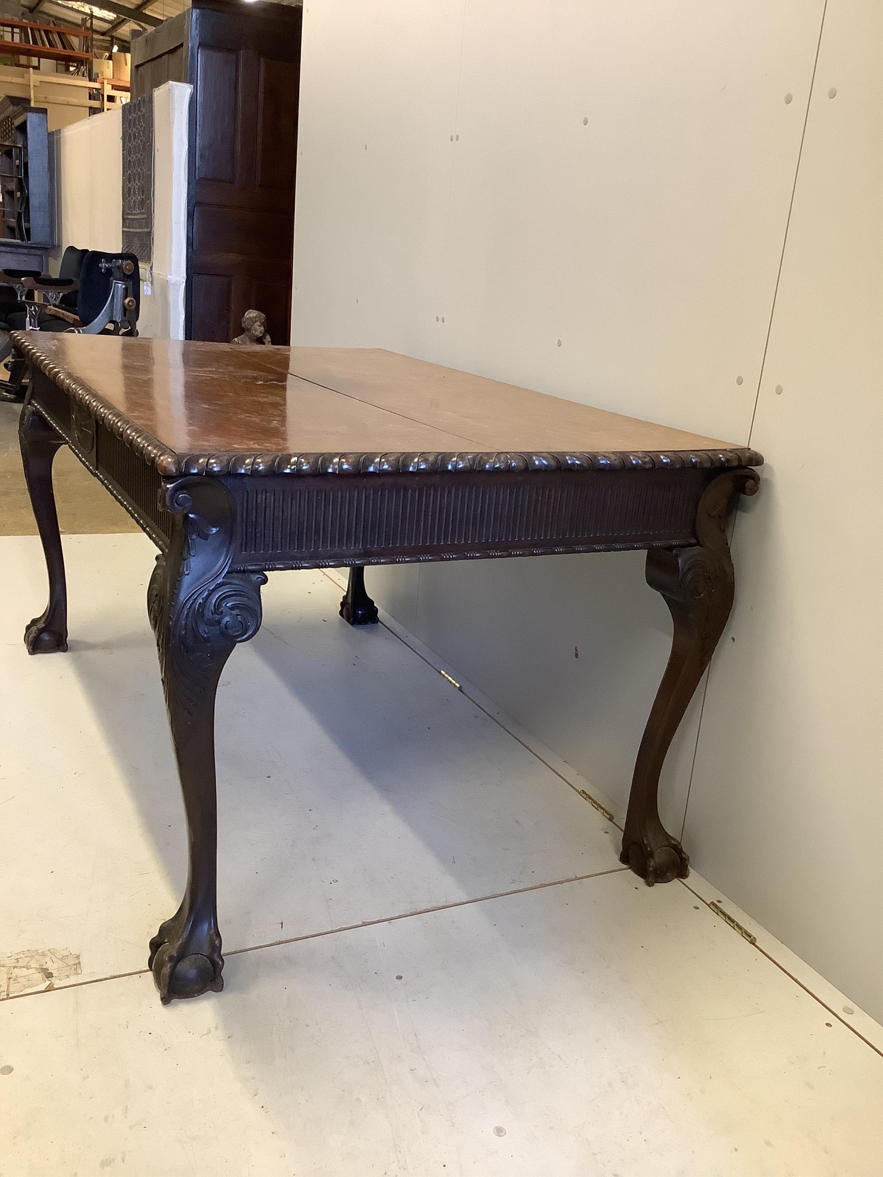 A Chippendale Revival rectangular mahogany table, width 152cm, depth 96cm, height 78cm and four chairs. Condition - fair